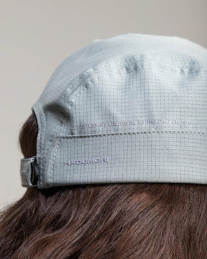 Hermanos Koumori x New Era Camper hat grey on model side detail view