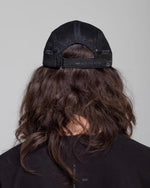 Hermanos Koumori x New Era Camper Cap Black back view on Model