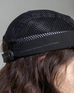 Hermanos Koumori x New Era Camper Cap Black side view close up on Model